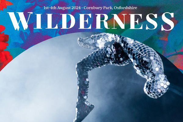 Wilderness text with blues, purples and a mirror-covered acrobat